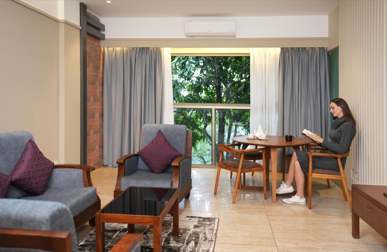 Elephant Passage Munnar Exterior photo A living room in a typical apartment