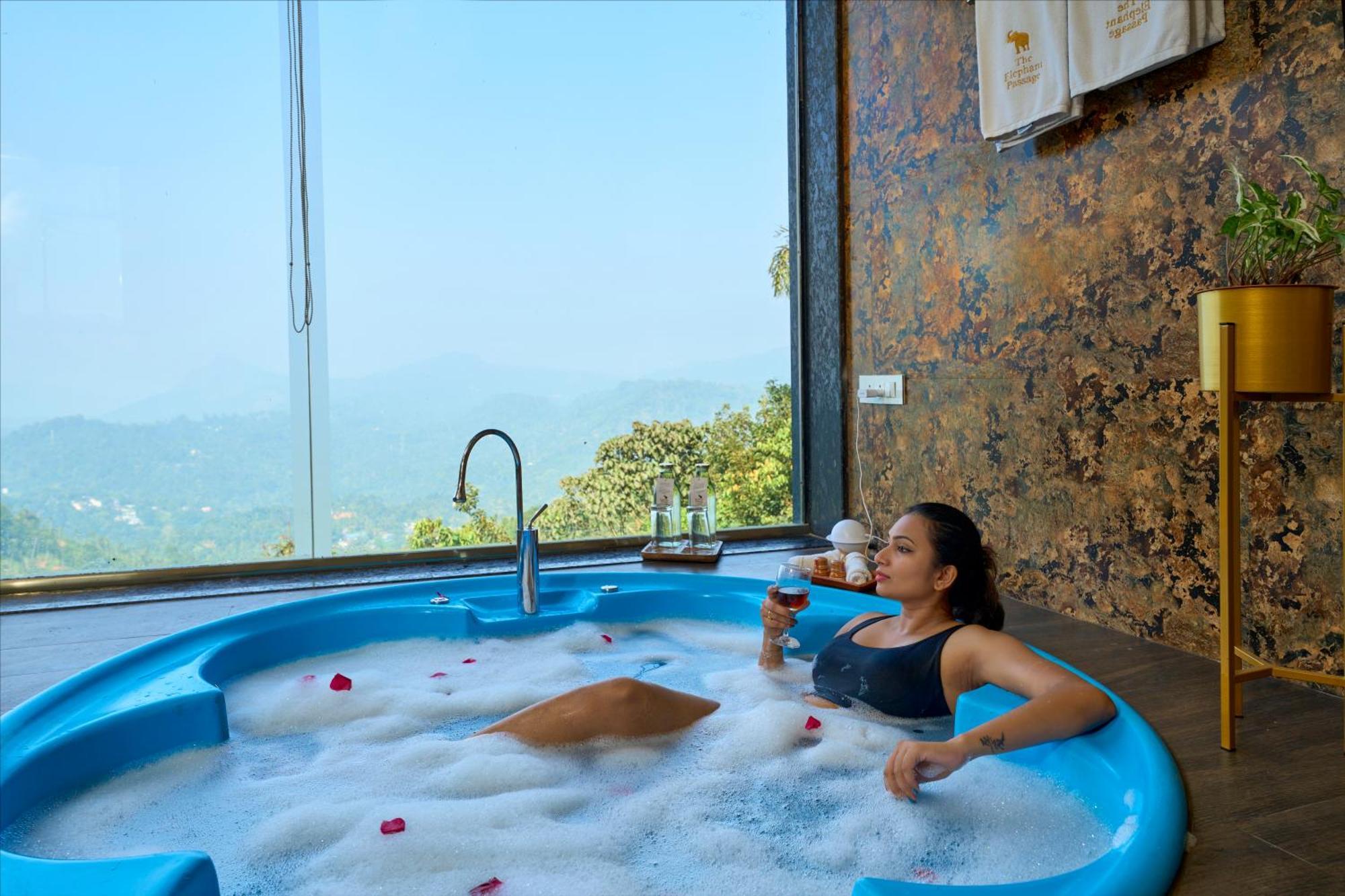 Elephant Passage Munnar Exterior photo A woman relaxing in a spa